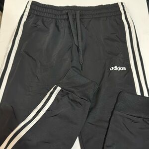 Adidas track jogger- soft material. At hip length. Minimal pilling to upper left